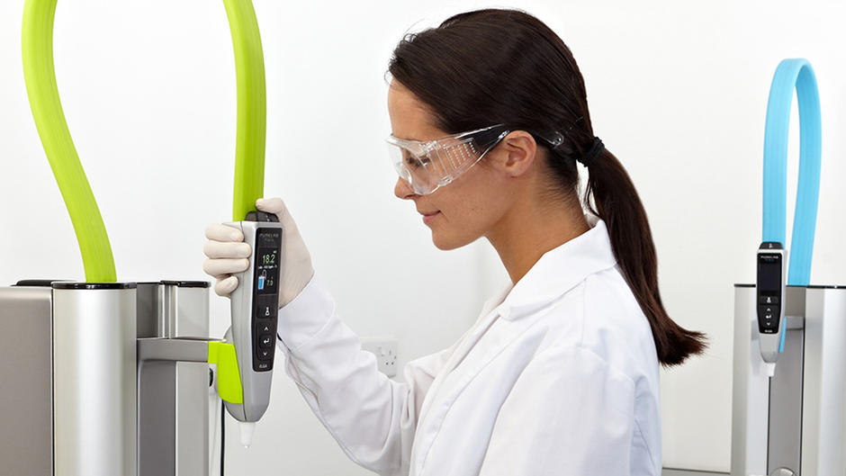 Laboratory employee using an ELGA ultrapure water system by Veolia
